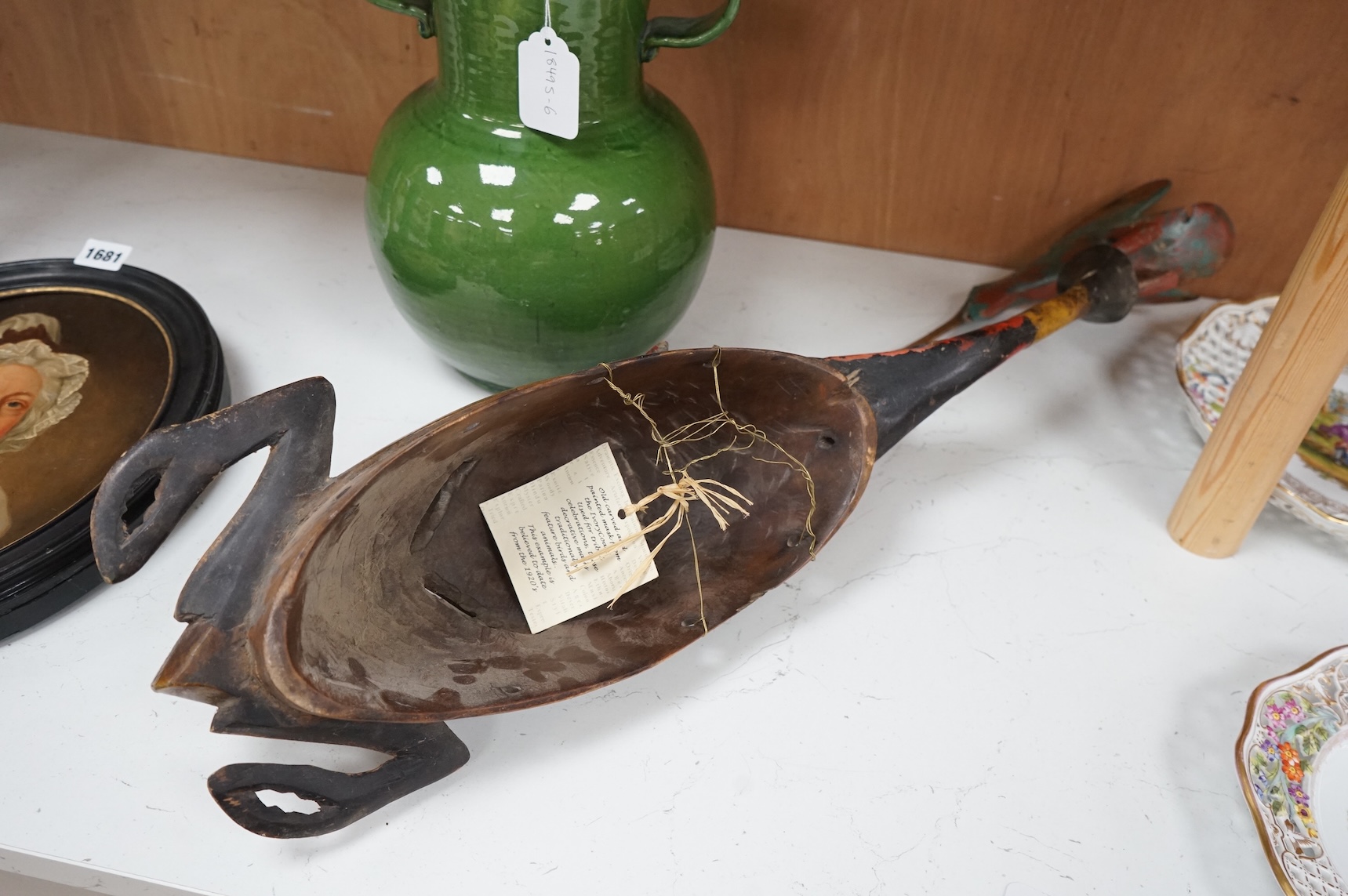 An early 20th century Tribal carved and painted mask from the Ivory Coast, 74cm in length